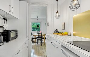 Fridge, stovetop, coffee/tea maker, cookware/dishes/utensils