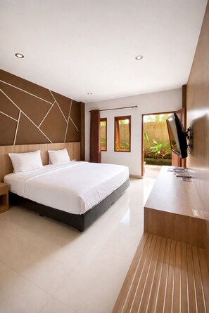 Deluxe Double Room | Select Comfort beds, bed sheets - Grand Kuta Hotel (Kuta)