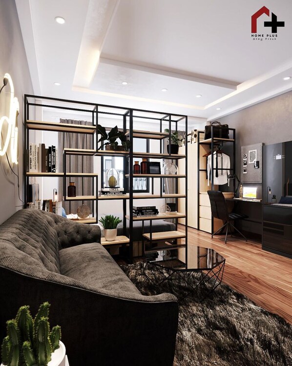 Deluxe Studio | Living area | 32-inch flat-screen TV with cable channels, TV - Manmo Home Plus Doi Can (Hanoi)