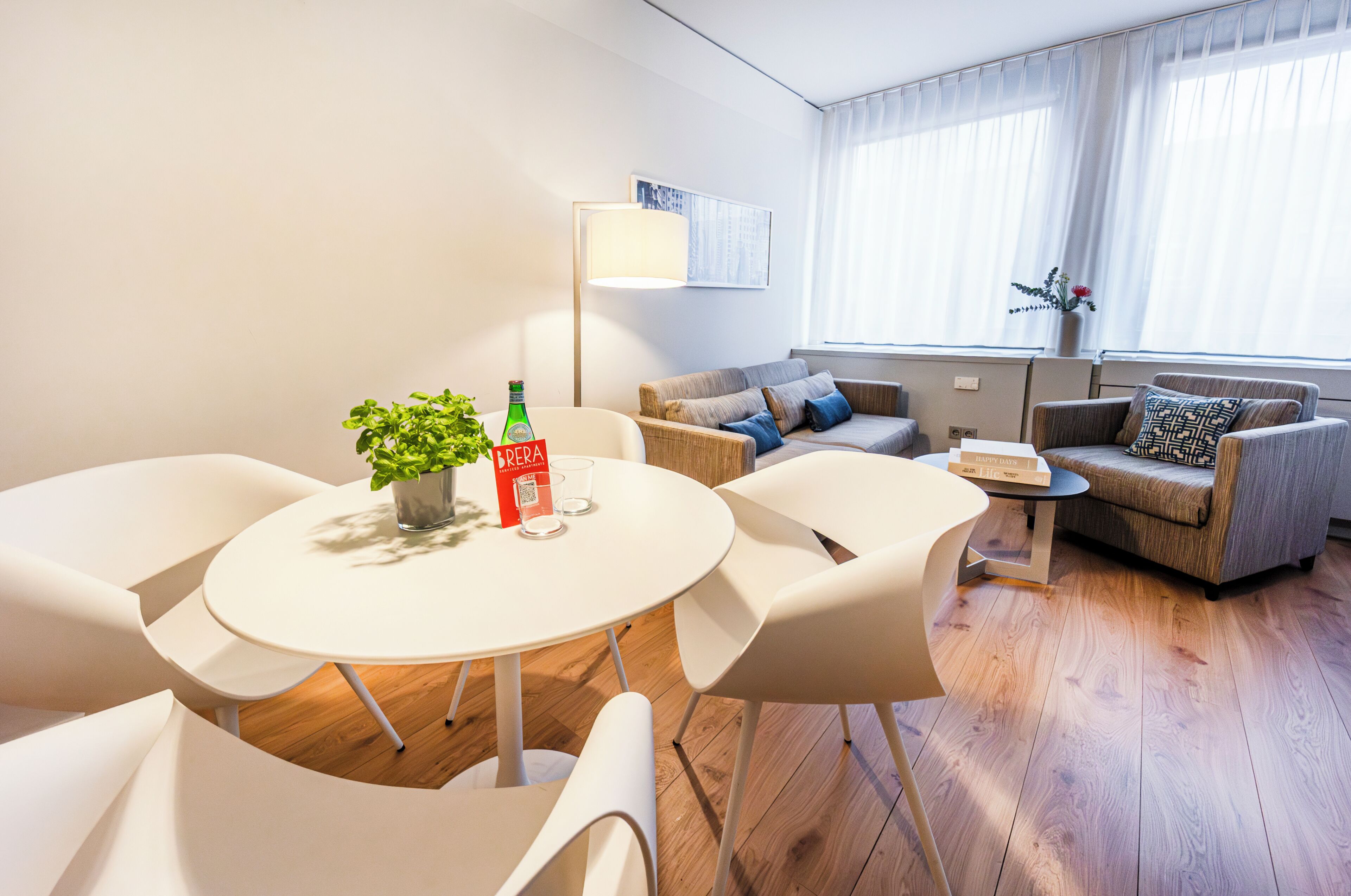 Apartment L - King bed | Living area | 20-inch flat-screen TV with cable channels, TV