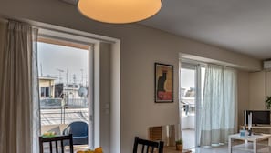 Apartment, 1 Bedroom | Living area | 20-inch flat-screen TV with cable channels, Smart TV