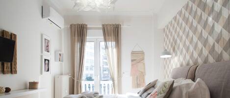 Apartment, 3 Bedrooms | 3 bedrooms, laptop workspace, soundproofing, iron/ironing board