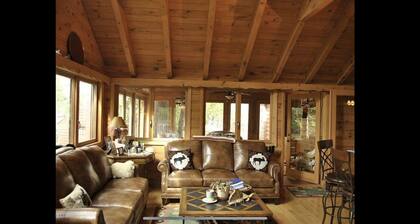 Beautiful Brant Lake home with direct lakefront, hot tub and snowmobile access!