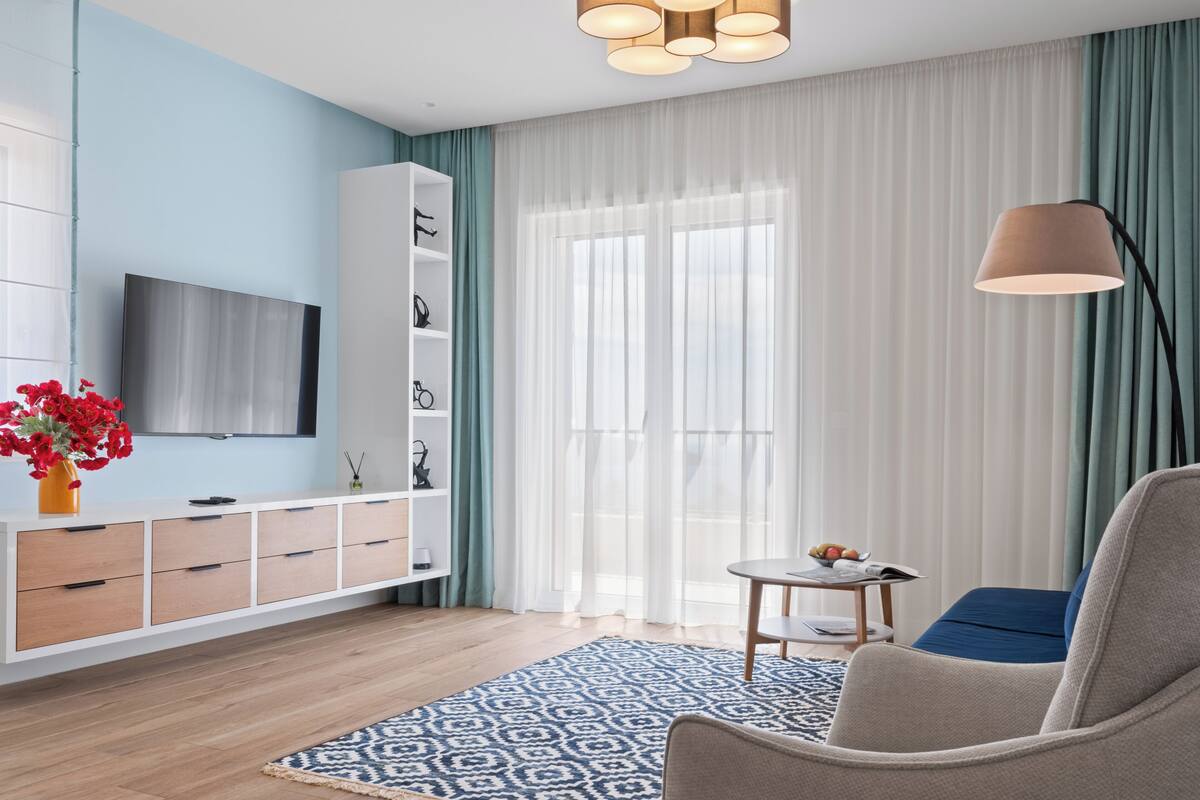 Luxe appartement, 2 slaapkamers | 1 slaapkamer, een kluis op de kamer, individueel gedecoreerd