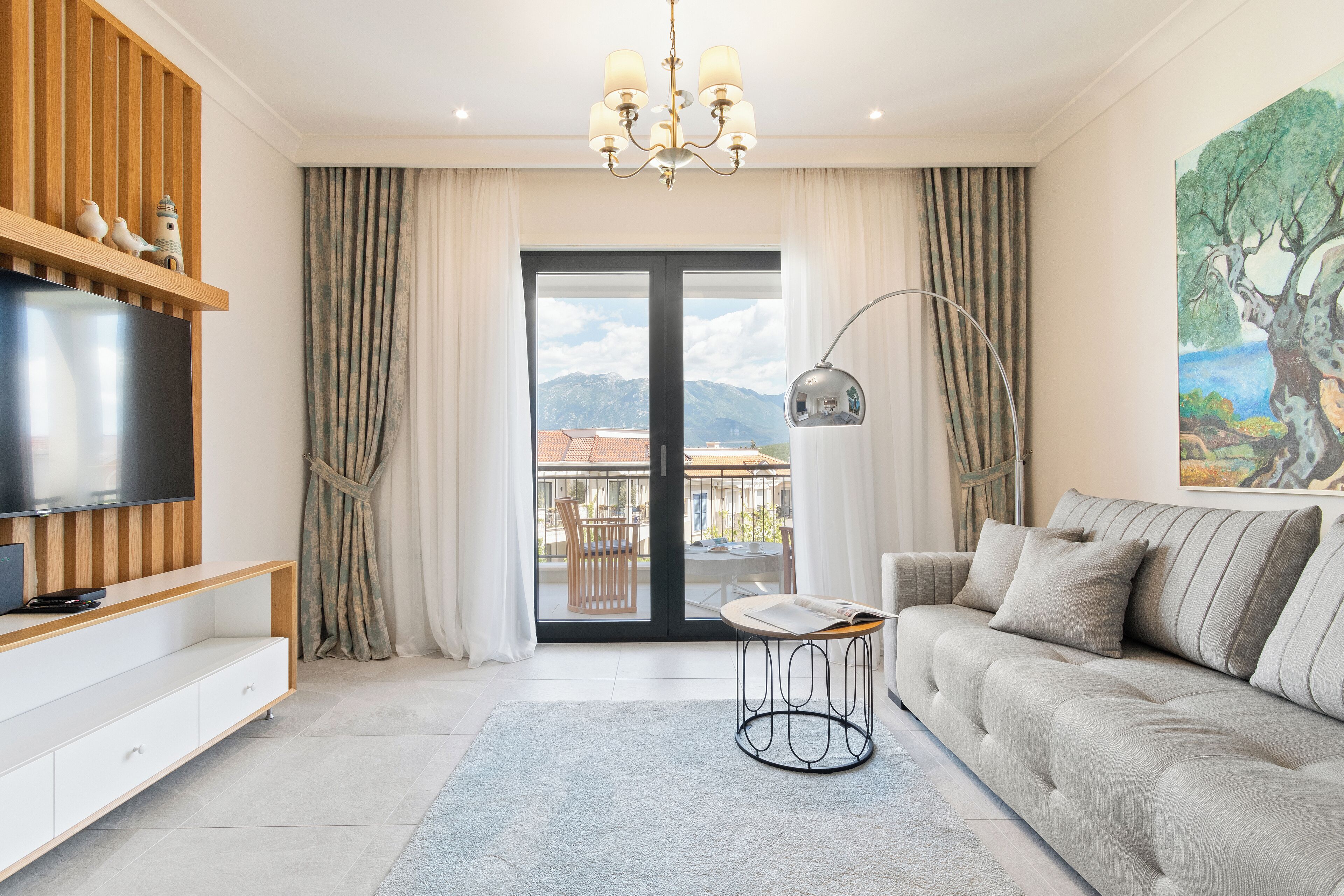 Deluxe Apartment | Living area | 42-inch flat-screen TV with satellite channels, TV, heated floors