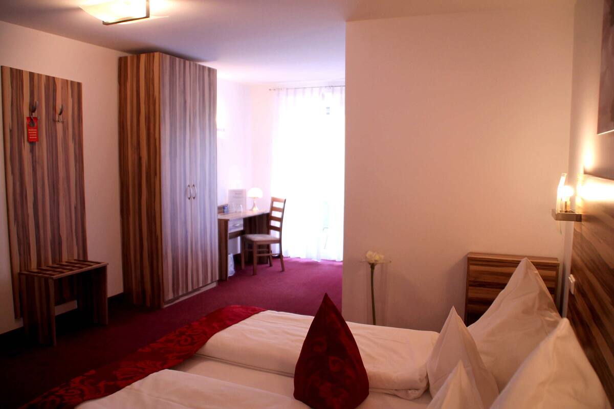 Deluxe Double Room, Balcony | Minibar, in-room safe, desk, free cots/infant beds
