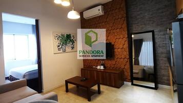 42-inch flat-screen TV with cable channels, TV