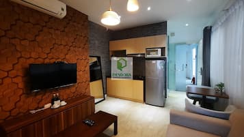 42-inch flat-screen TV with cable channels, TV