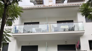 A building with a sign reading "DONA CARMEN" and a number "44" indicating its address. - Fuengirola, 1 min. walk from the beach  (Fuengirola)