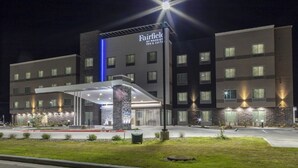 A multi-story hotel with a prominent entrance and a covered area. - Fairfield Inn & Suites by Marriott Monahans (Monahans)