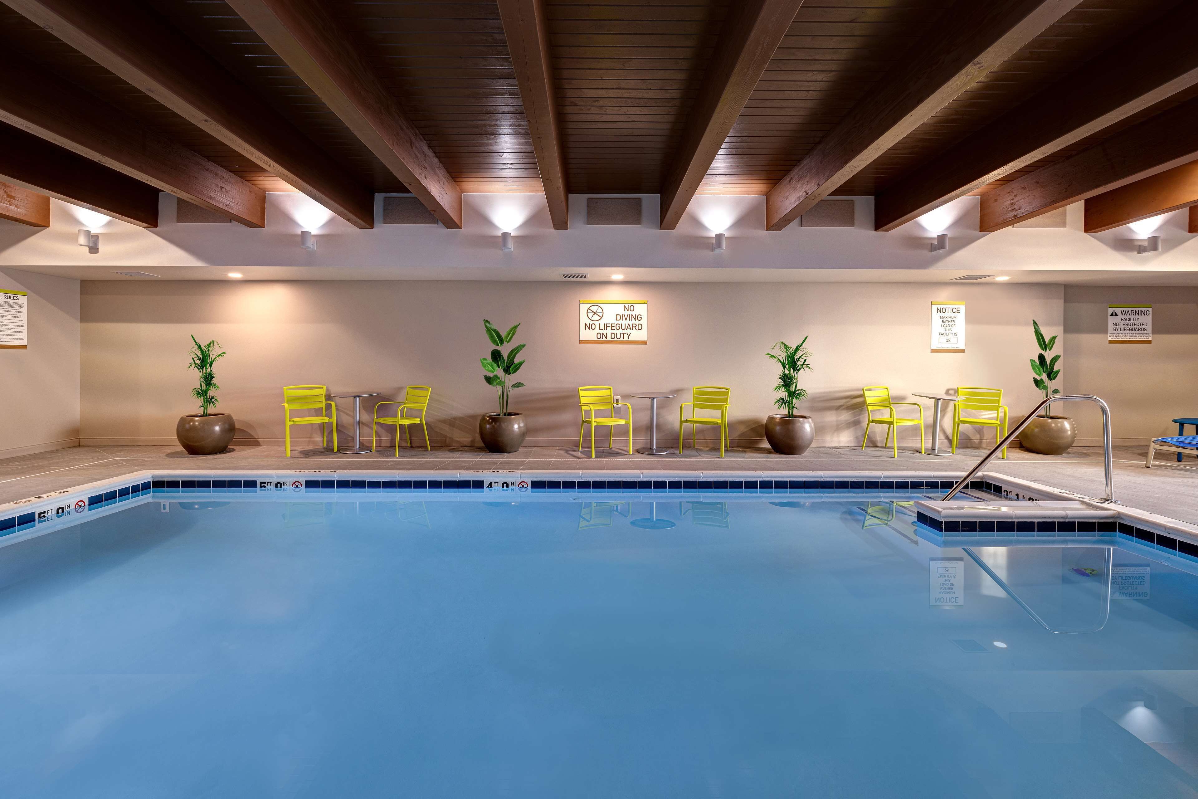 indoor pool, open 7:00 am to 11:00 pm, pool loungers