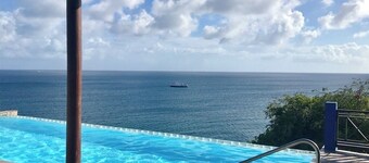 Lovely hillside villa overlooking the Caribbean Sea with private plunge pool.