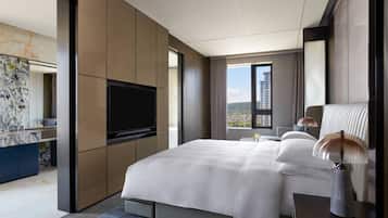 Premium bedding, down comforters, minibar, in-room safe