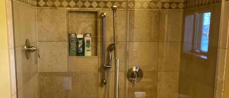 Shower, hair dryer, towels, soap