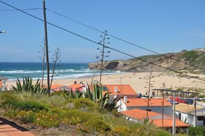 On the beach, sun-loungers, beach towels