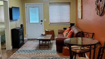 Smart TV, fireplace, books