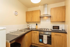Apartament, bany privat (Pear Suite) | Cuina compartida