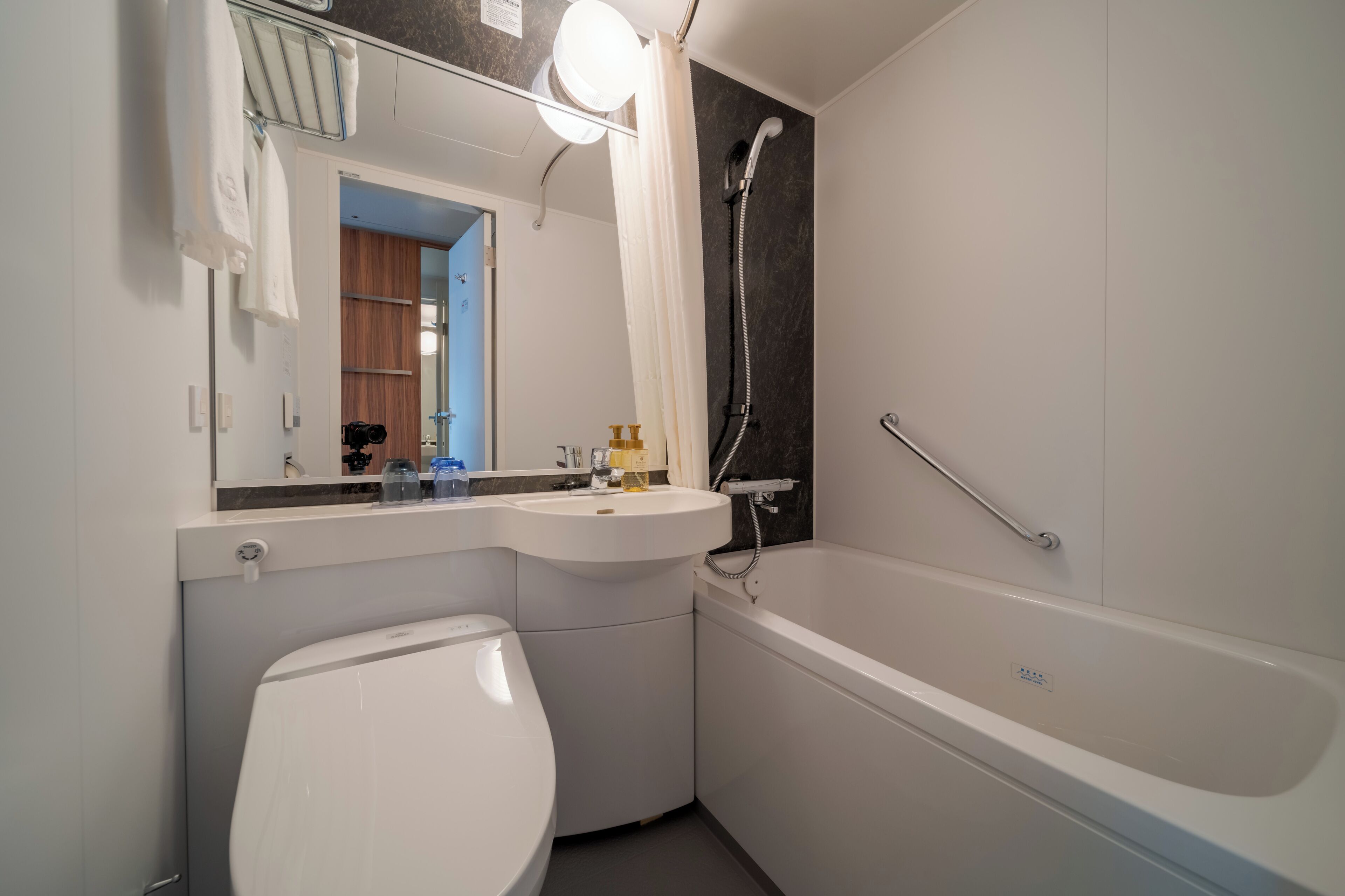 free toiletries, hair dryer, slippers, electronic bidet