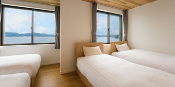 2 dormitorios, ropa de cama de alta calidad, edredones de plumas