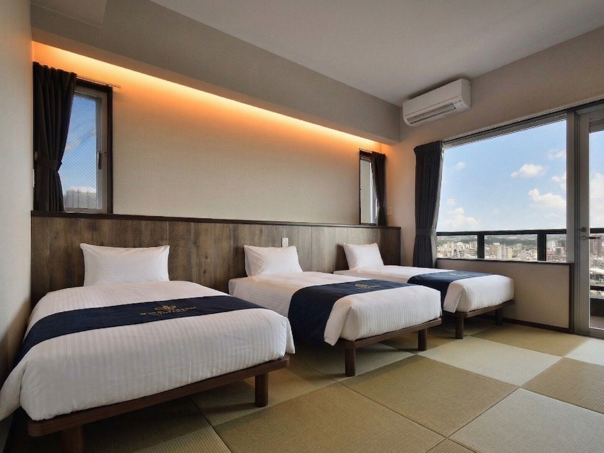 Japanese-style Suite | Down comforters, blackout drapes, free WiFi, bed sheets