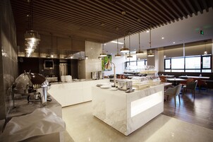 Se ofrece un desayuno autoservicio (15 CNY por persona)