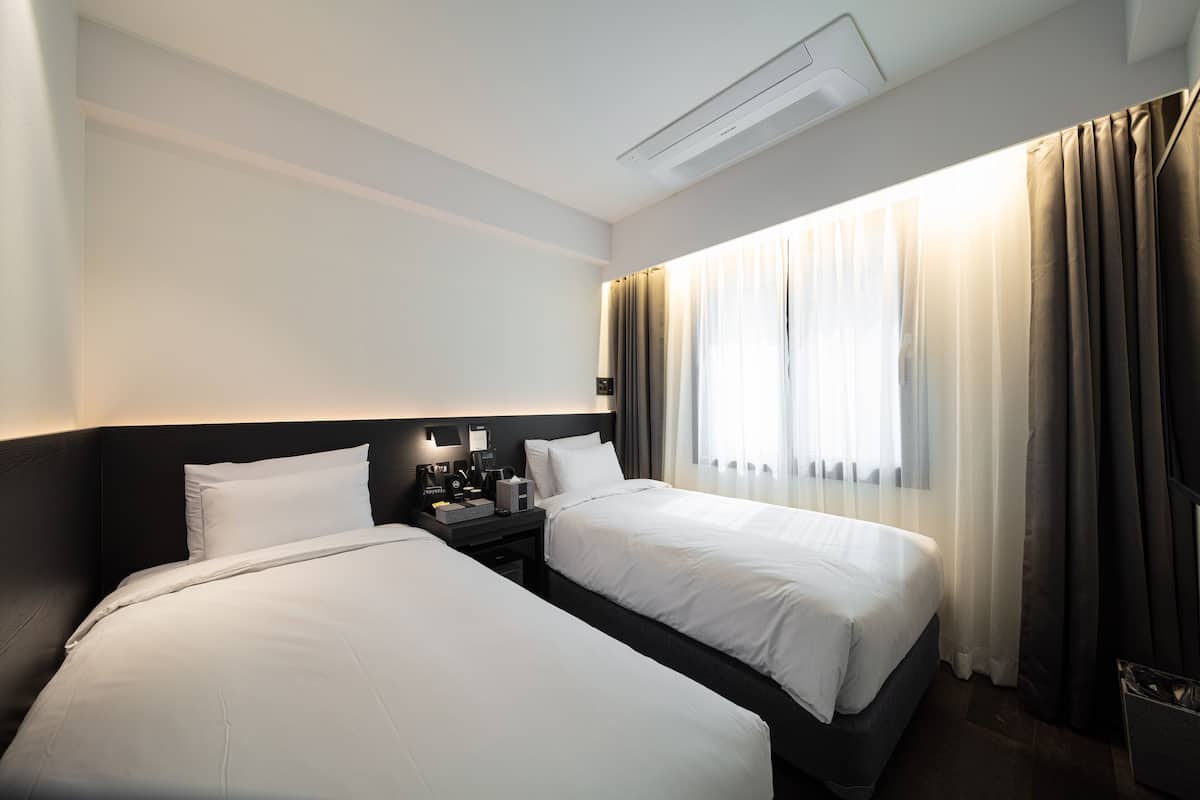 compact twin | 1 bedroom, free wifi, bed sheets