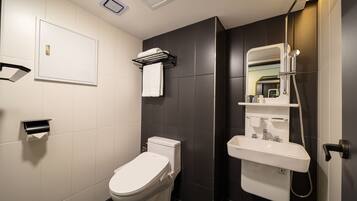 Compact Twin | Bathroom | Free toiletries, hair dryer, bathrobes, slippers