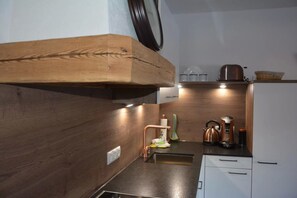 Apartment (Südblick) | Eigene Küche | Kühlschrank, Ofen, Herdplatte, Geschirrspüler