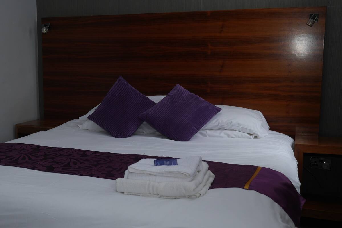 Individually furnished, desk, laptop workspace, iron/ironing board