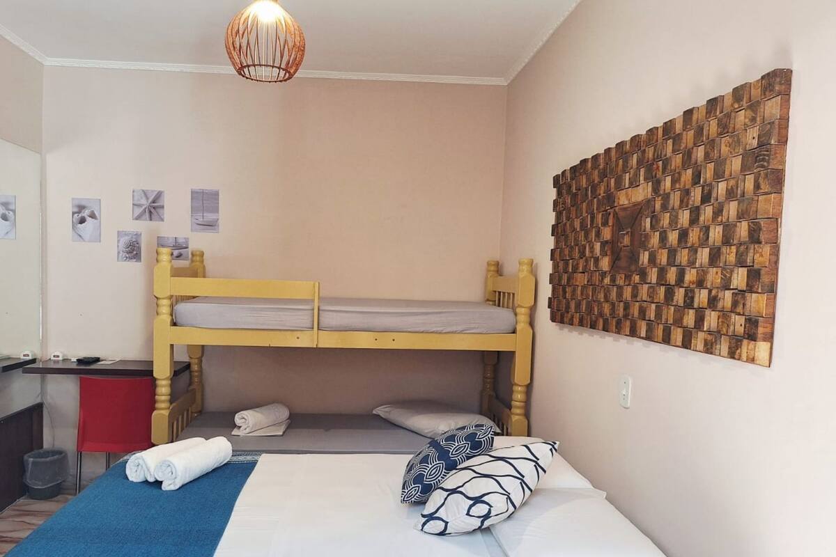 Economy Quadruple Room | Minibar, desk, WiFi (free), bed sheets