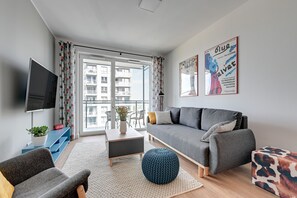 Deluxe-huoneisto | Olohuone | Taulutelevisio