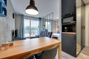 Deluxe-studiosviitti | Oleskelualue | Taulutelevisio