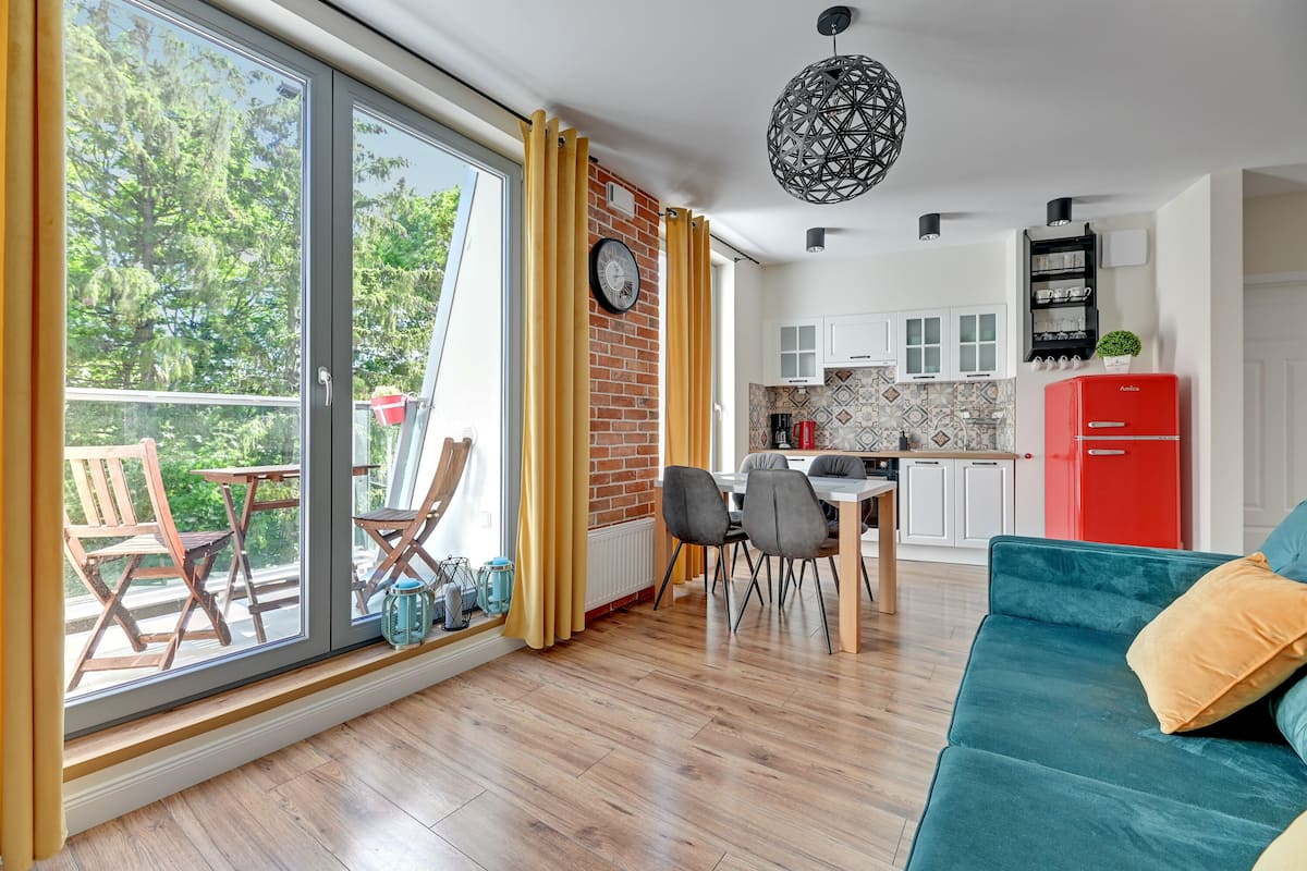 Premium appartement | Woonkamer | Flatscreentelevisie