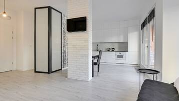 Standard Apartment, 1 Bedroom | Living area | 30-cm flat-screen TV with cable channels, TV