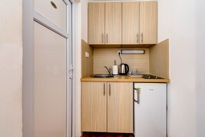 Suite estudio familiar | Cocineta privada | Refrigerador y tetera eléctrica