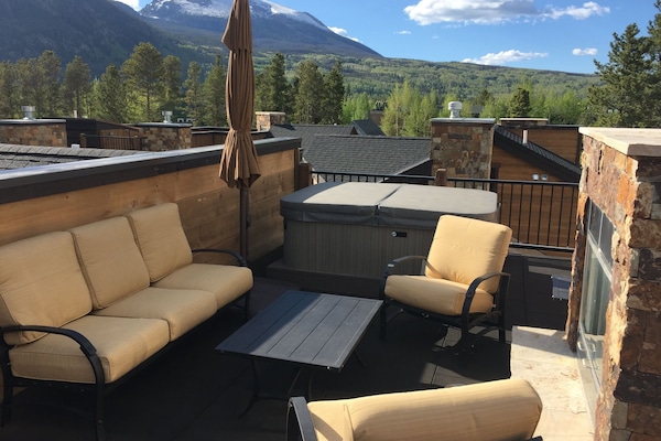 Rooftop deck with hot tub and gas fireplace