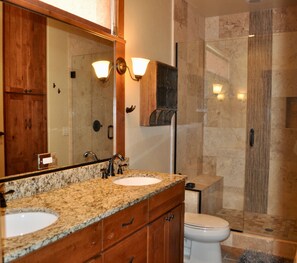 Combined shower/bathtub, hair dryer, towels, soap