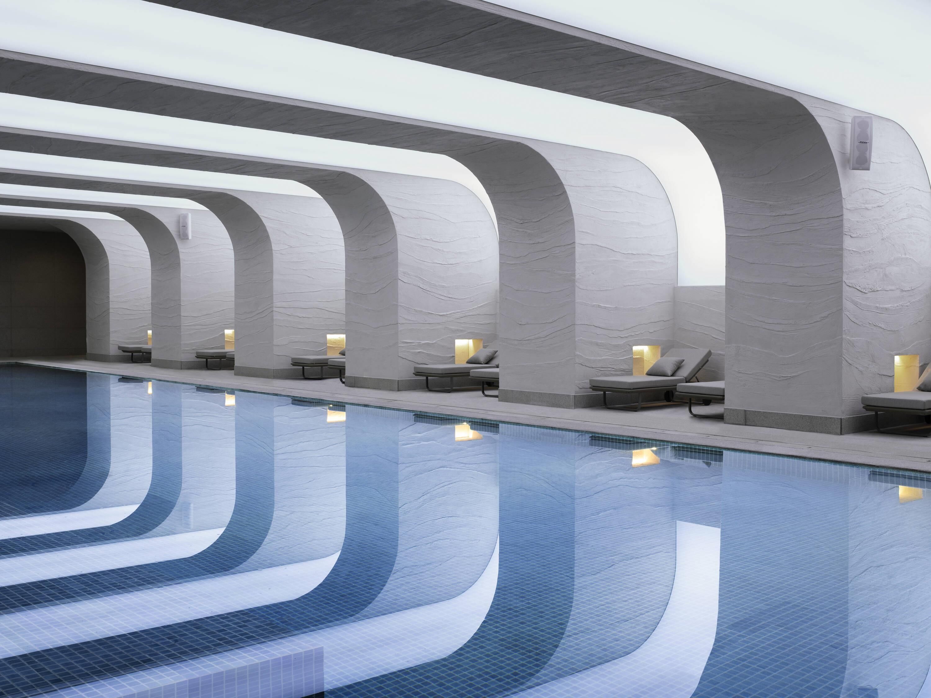 Indoor pool, seasonal outdoor pool, pool umbrellas, pool loungers