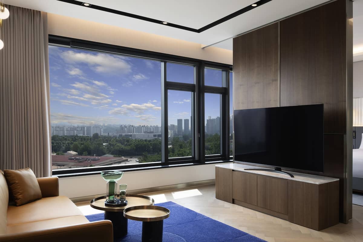 Suite, 1 King Bed (City) | Premium bedding, minibar, in-room safe, blackout drapes