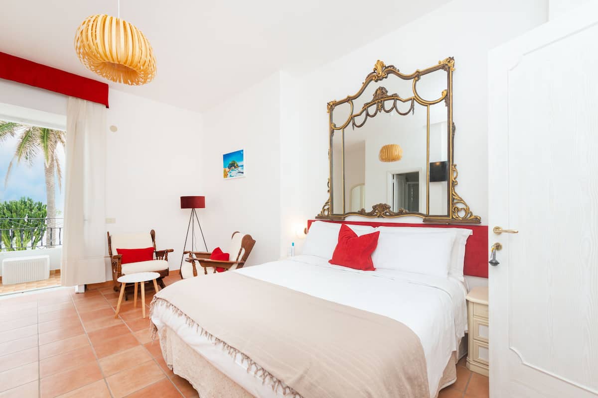 Suite, Sea View | Down duvets, minibar, desk, free WiFi