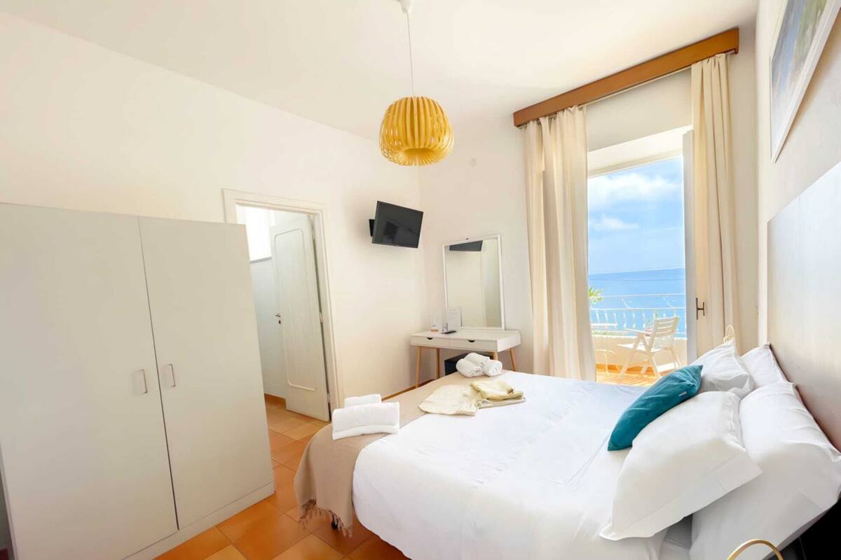 Quarto família | Edredons de pluma, frigobar, Wi-Fi de cortesia, roupa de cama