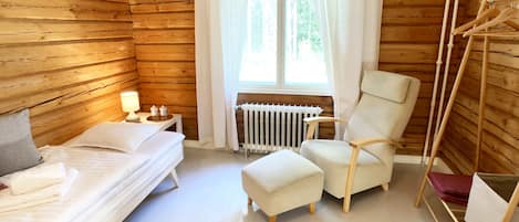 Luola Twin Room, Shared Bathroom | 1 bedroom, individually decorated, individually furnished, desk