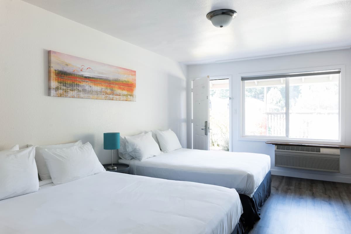 double room, 2 queen beds, pool view, ground floor | 1 bedroom, bed sheets