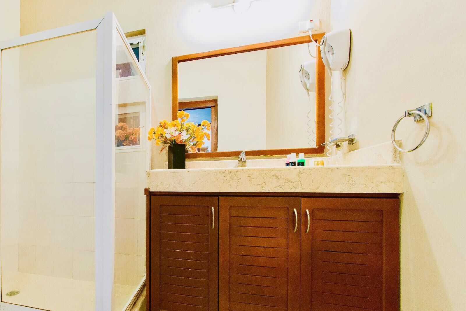 Shower, hair dryer, towels, soap