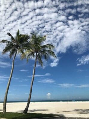 On the beach, sun-loungers, beach towels