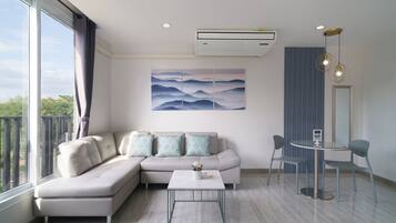 Master Suite | Área de sala de estar | Televisión