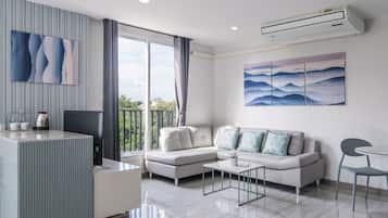 Master Suite | Área de sala de estar | Televisión