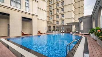 Outdoor pool, open 6:00 AM to 7:00 PM, pool umbrellas, sun loungers