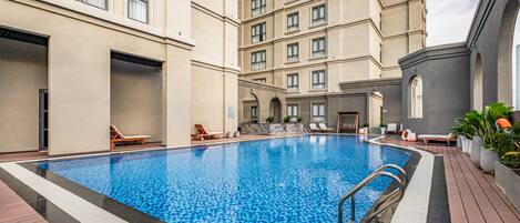 Outdoor pool, open 6:00 AM to 7:00 PM, pool umbrellas, sun loungers