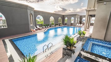 Outdoor pool, open 6:00 AM to 7:00 PM, pool umbrellas, sun loungers